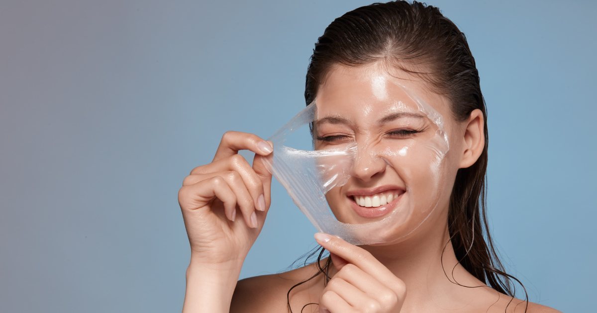 Woman removing face mask after chemical peels treatments in San Antonio, TX